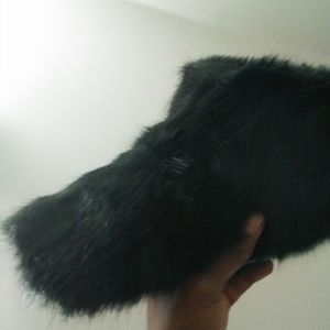 Women's size 9 UGG slipper furry. Fits small by 1